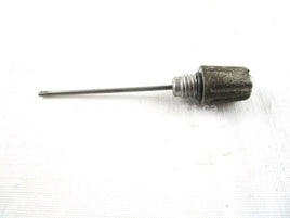 A used Oil Dipstick from a 2001 XPLORER 400 Polaris OEM Part # 3086761 for sale. Looking for Polaris ATV parts near Edmonton? We ship daily across Canada!
