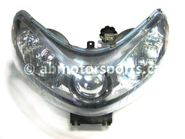Used Polaris Snowmobile RMK 700 OEM part # 2410397 head light for sale