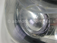 Used Polaris Snowmobile RMK 700 OEM part # 2410397 head light for sale