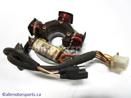 Used Polaris Snowmobile INDY LITE OEM Part # 3084258 STATOR PLATE WITH LIGHTING AND IGNITION COIL for sale