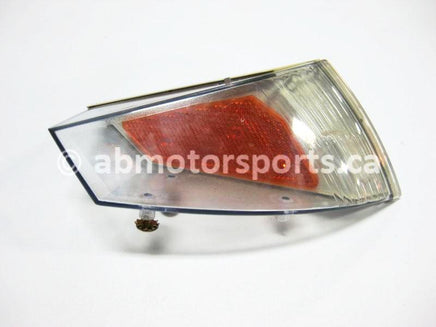Used Polaris Snowmobile 440 LC OEM part # 5431856 right reflector lens for sale