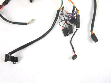 A used Main Wiring Harness from a 2003 RMK 800 144 Polaris OEM Part # 2461116 for sale. Our online catalog has more parts that will fit your unit!