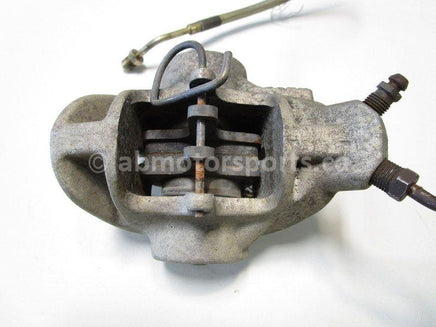 A used Brake Caliper Assembly from a 2005 RMK 900 Polaris OEM Part # 2202728 for sale. Online Polaris snowmobile parts in Alberta, shipping daily across Canada!