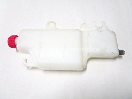 A used Coolant Reservoir from a 1997 RMK 500 Polaris OEM Part # 5431733
 for sale. Check out our online catalog for more parts that fit your unit!