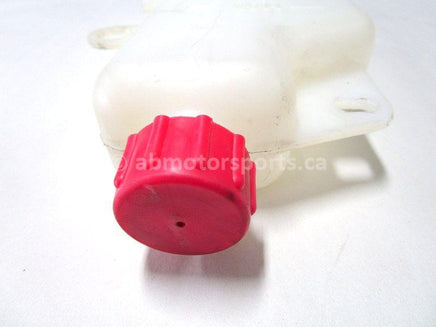 A used Coolant Reservoir from a 1997 RMK 500 Polaris OEM Part # 5431733
 for sale. Check out our online catalog for more parts that fit your unit!