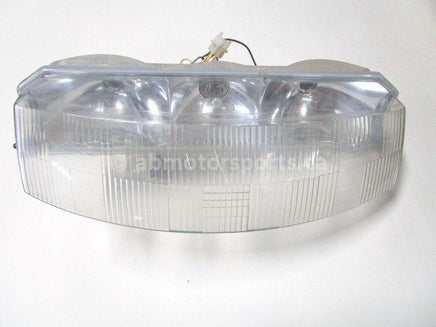 A used Headlight from a 1997 RMK 500 Polaris OEM Part # 2431008 for sale. Check out our online catalog for more parts that will fit your unit!