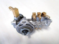 Used 2013 Polaris RMK PRO 800 Snowmobile OEM part # 1204438 oil pump for sale