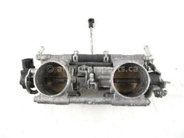 A used Throttle Body from a 2012 RMK PRO 800 - 163 INCH Polaris OEM Part # 1204094
 for sale. Check out our online catalog for more parts!