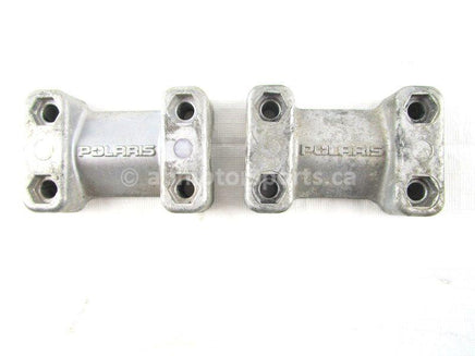 A used Handlebar Block from a 2000 RMK 600 Polaris OEM Part # 5630187-067 for sale. Check out our online catalog for more parts that will fit your unit!