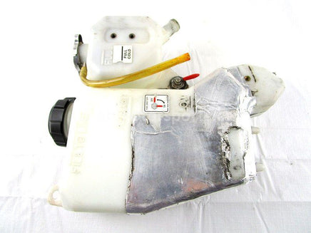 A used Oil Tank from a 2000 RMK 600 Polaris OEM Part # 1253353 for sale. Check out our online catalog for more parts that will fit your unit!