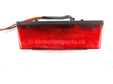 A used Tail Light from a 2000 RMK 600 Polaris OEM Part # 4032087 for sale. Check out our online catalog for more parts that will fit your unit!