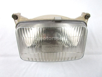 A used Head Light from a 1998 RMK 700 Polaris OEM Part # 4032040 for sale. Online Polaris snowmobile parts in Alberta, shipping daily across Canada!