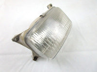 A used Head Light from a 1998 RMK 700 Polaris OEM Part # 4032040 for sale. Online Polaris snowmobile parts in Alberta, shipping daily across Canada!
