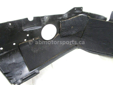 A used Belly Pan Right from a 2006 FST CLASSIC 750 Polaris OEM Part # 2633275-070 for sale. Check out Polaris snowmobile parts in our online catalog!