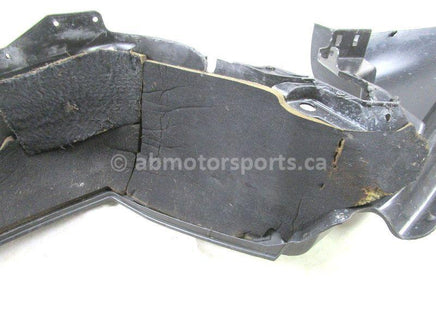 A used Belly Pan Right from a 2006 FST CLASSIC 750 Polaris OEM Part # 2633275-070 for sale. Check out Polaris snowmobile parts in our online catalog!
