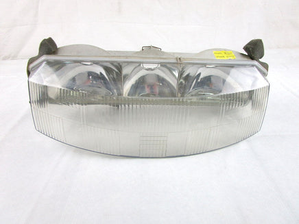 A used Headlight from a 2001 RMK 800 Polaris OEM Part # 2433016 for sale. Check out Polaris snowmobile parts in our online catalog!