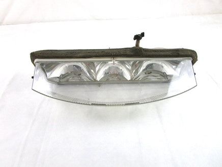 A used Headlight from a 2001 RMK 800 Polaris OEM Part # 2433016 for sale. Check out Polaris snowmobile parts in our online catalog!