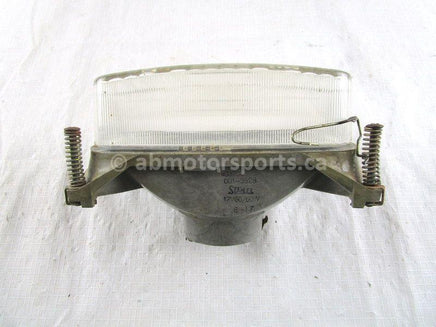 A used Head Light from a 1990 TRAIL Polaris OEM Part # 4032038 for sale. Check out Polaris snowmobile parts in our online catalog!