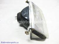 Used Skidoo Touring 380 LE OEM Part # 410608800 head light for sale