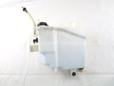 A used Oil Tank from a 2007 MXZ RENEGADE 800 X HO Ski Doo OEM Part # 519000111 for sale. Check out our online catalog for more parts!