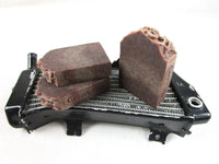This MA-HOOSIVE bar of handcrafted mechanics soap is packed with triple brewed medium grind coffee and pumice. Lightly scented with coffee and chocolate fragrance oils. All products from The Groovy Hen are Health Canada registered and compliant.