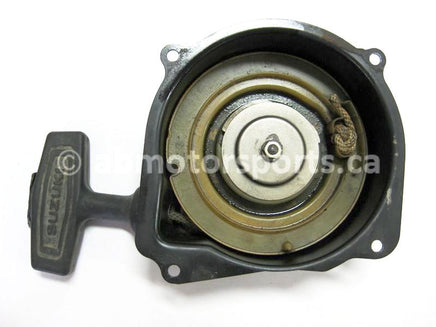 Used Suzuki LT 230 OEM part # 18100-18A10 starter recoil for sale
