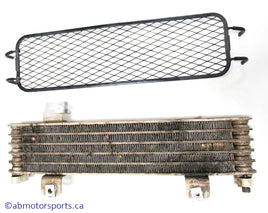 Used Suzuki ATV EIGER 400 OEM part # 16600-38F20 oil cooler assembly for sale