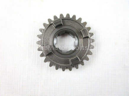A used Third Driven Gear 26T from a 2004 QUAD SPORT Z400 Suzuki OEM Part # 24331-07G00 for sale. Shipping Suzuki parts across Canada daily!