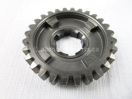A used Reverse Driven Gear 28T from a 2004 QUAD SPORT Z400 Suzuki OEM Part # 24571-07G01 for sale. Shipping Suzuki parts across Canada daily!