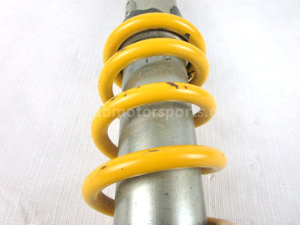 A used Front Shock from a 2004 QUAD SPORT Z400 Suzuki OEM Part # 52100-07G00-37W for sale. Shipping Suzuki parts across Canada daily!