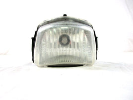 A used Headlight Assembly from a 2006 KING QUAD 700 4X4 Suzuki OEM Part # 35100-31GA0-999 for sale. Suzuki ATV parts… Shop our online catalog… Alberta Canada!