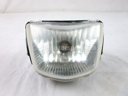 A used Headlight Assembly from a 2006 KING QUAD 700 4X4 Suzuki OEM Part # 35100-31GA0-999 for sale. Suzuki ATV parts… Shop our online catalog… Alberta Canada!