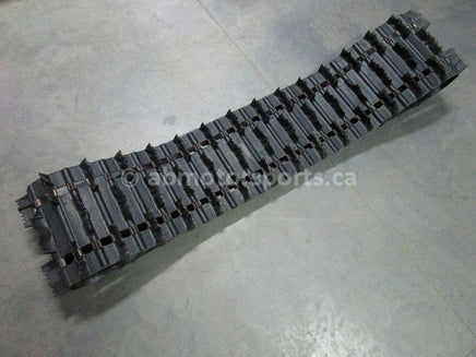 A used 15 inch X 156 inch Camoplast Sled Track Part # 679-9808 for sale. Check out our online catalog for more parts that will fit your unit!