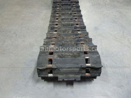 A used 15 inch X 136 inch Camoplast Sled Track Part # 0602-805 for sale. Check out our online catalog for more parts that will fit your unit!