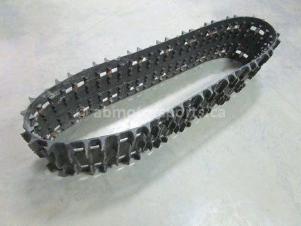 A used 15 inch X 136 inch Camoplast Sled Track Part # 570-2111 for sale. Check out our online catalog for more parts that will fit your unit!