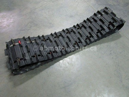 A used 15 inch X 136 inch Camoplast Sled Track Part # 570-2111 for sale. Check out our online catalog for more parts that will fit your unit!
