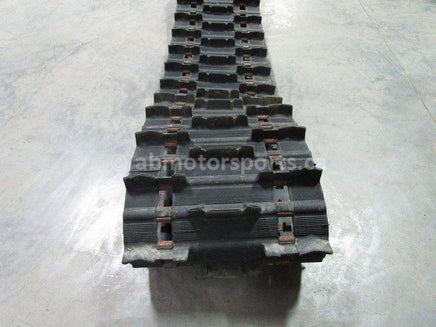 A used 15 inch X 136 inch Camoplast Sled Track Part # 0602-805 for sale. Check out our online catalog for more parts that will fit your unit!