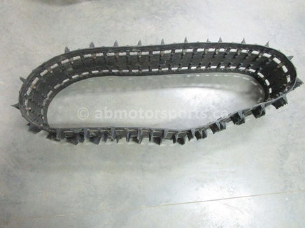 A used 15 inch X 153 inch Camoplast Sled Track Part # 1602-995 for sale. Check out our online catalog for more parts that will fit your unit!