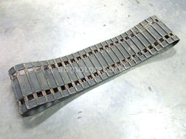 A used 15 inch X 136 inch Camoplast Sled Track OEM Part # 8X0-47110-00-00 for sale. Check out our online catalog for more parts that will fit your unit!