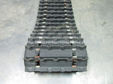 A used 15 inch X 136 inch Camoplast Sled Track OEM Part # 679-9781 for sale. Check out our online catalog for more parts that will fit your unit!