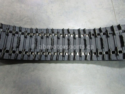 A used 15 inch X 136 inch with a 1.75 paddle height Camoplast Polaris Sled Track OEM part # 5411237 for sale. Check out our online catalog for more parts that will fit your unit!