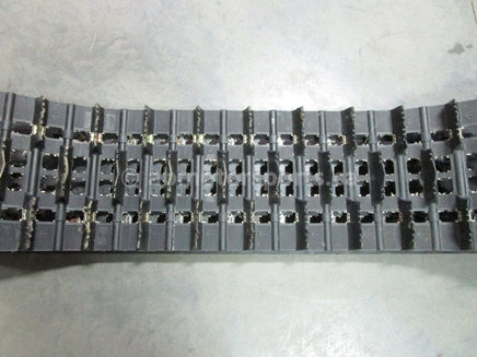 A used 16 inch X 154 inch 2.25 inch paddle Camoplast Sled Track OEM part # 504152800 for sale. Check out our online catalog for more parts that will fit your unit!