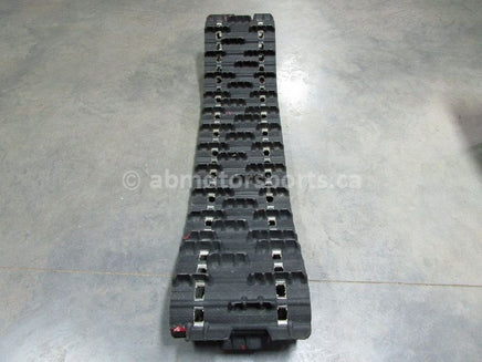 A used 15 inch X 144 inch with a 1.75 inch paddle Camoplast Sled Track for sale. Check out our online catalog for more parts that will fit your unit!