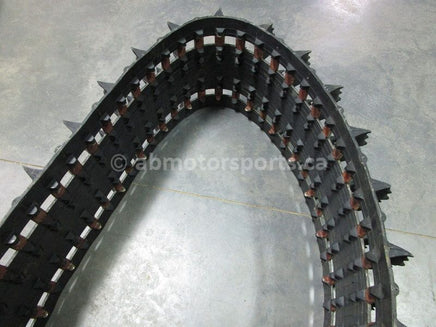 A used 15 inch X 156 inch with a 2 inch paddle Camoplast Sled Track for sale. Check out our online catalog for more parts that will fit your unit!