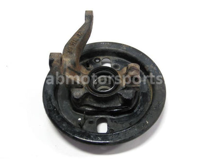 Used Yamaha ATV KODIAK 400 OEM part # 3HN-23502-01-00 right steering knuckle and backing plate for sale