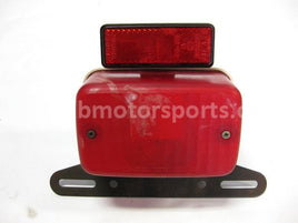 Used Yamaha ATV KODIAK 400 OEM part # 52H-84710-00-00 OR 21V-84710-00-00 tail light for sale