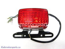 Used Yamaha ATV GRIZZLY 660 OEM part # 5KM-84710-00-00 tail light for sale