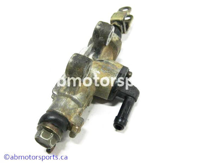 Used Yamaha ATV GRIZZLY 660 OEM part # 5KM-2583V-00-00 rear master cylinder for sale