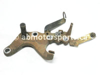 Used Yamaha ATV GRIZZLY 660 SE OEM part # 5KM-27263-00-00 rear brake mount bracket for sale