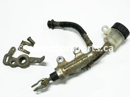 Used Yamaha ATV GRIZZLY 660 SE OEM part # 5KM-2583V-00-00 rear master cylinder for sale